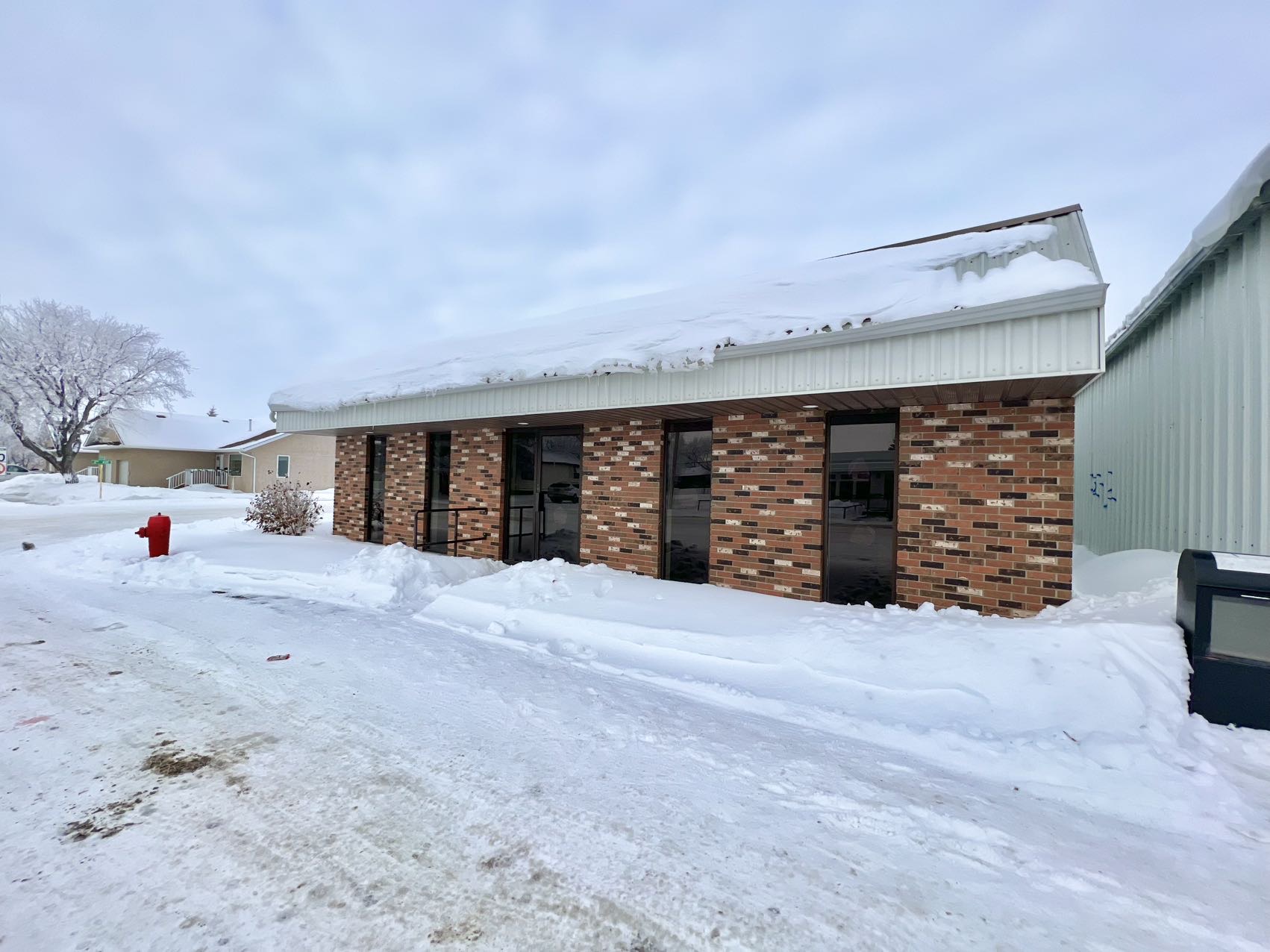 Wakaw小镇零售店，9万9（现有租户$1200/月）