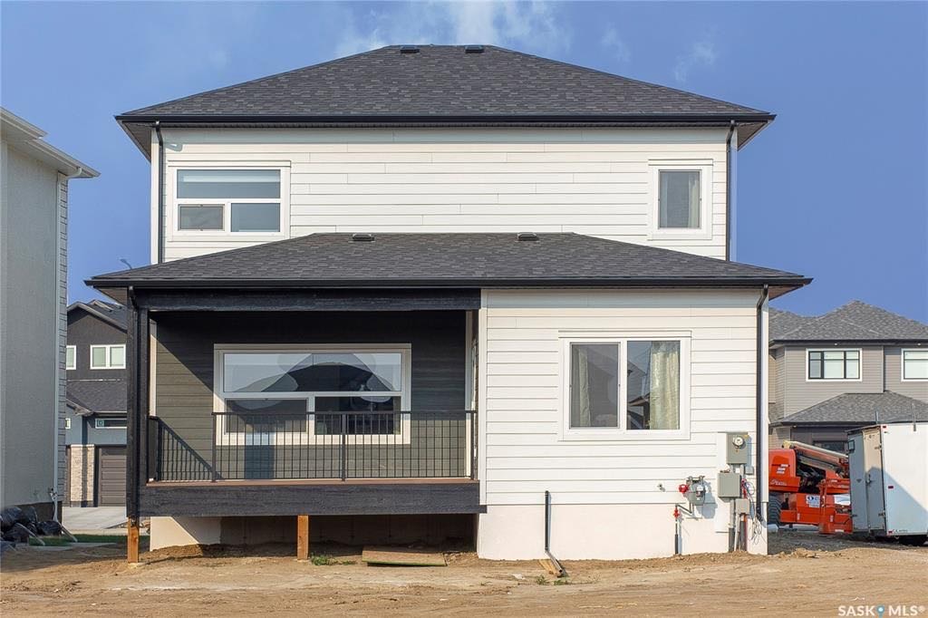 Aspen Ridge小区2021年建1880尺3室3卫双层独立屋出售。外观精美，全屋高品质装修。周边自然环境优美，步行可达湿地公园。三层楼全部挑高9英尺，一楼加大尺寸欧式窗户，高级复合地板，开放式厨房，石英石台面，高档橱柜，黑色背板，巨大的中岛和附加的储物空间。宽敞明亮的客厅设 - 4