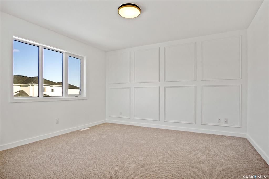 Aspen Ridge小区2021年建全新近2000尺3室3卫带一个多功能厅bonus room双层独立屋出售。全屋高品质装修。步行可达湿地公园。三层楼全部挑高9英尺，一楼加大尺寸欧式窗户，高级复合地板，开放式厨房，石英石台面，高档橱柜，黑色背板，巨大的中岛和附加的储物空间。宽敞 - 9