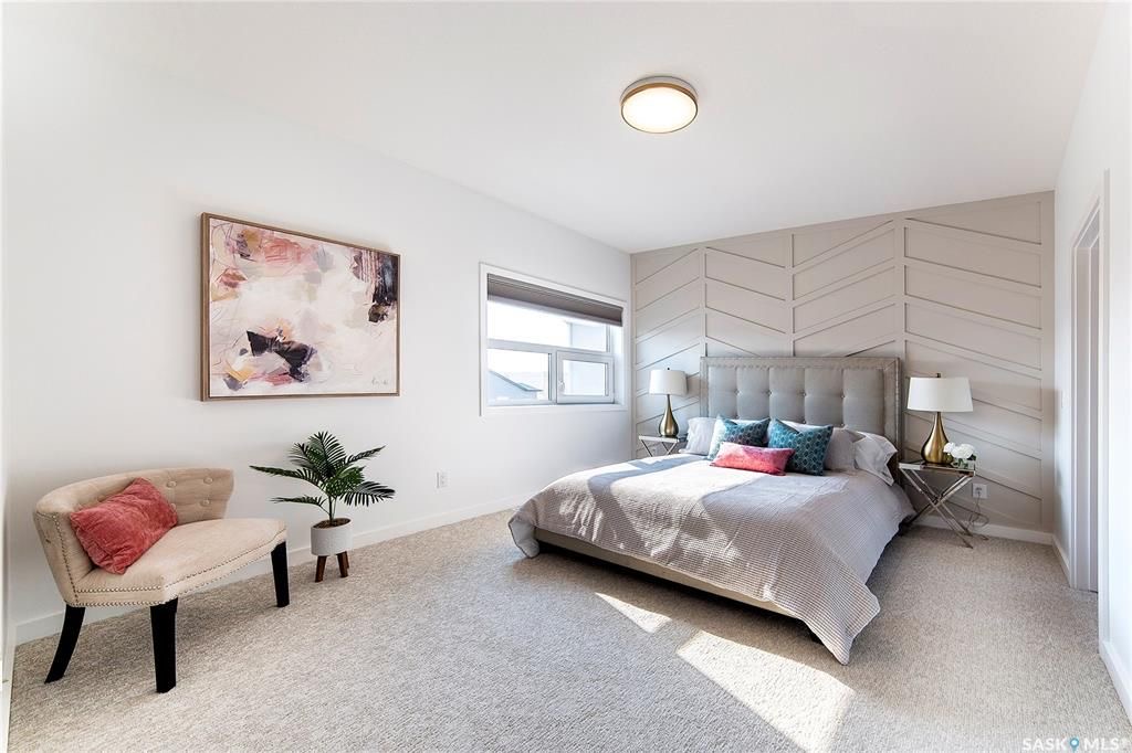 Aspen Ridge小区2021年建1880尺3室3卫双层独立屋出售。外观精美，全屋高品质装修。周边自然环境优美，步行可达湿地公园。三层楼全部挑高9英尺，一楼加大尺寸欧式窗户，高级复合地板，开放式厨房，石英石台面，高档橱柜，黑色背板，巨大的中岛和附加的储物空间。宽敞明亮的客厅设 - 8