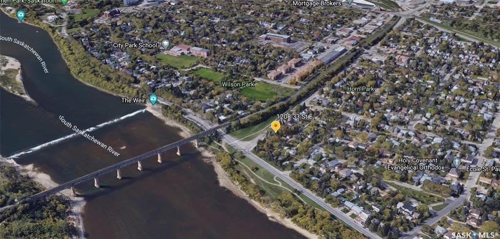 North Park 小区 868尺平层独立屋出售。拥有稀缺Saskatchewan River 河景。较新装修厨房，洗手间，部分新窗户。地下室有独立出入口，独立厨房洗手间套间用于出租。另有大尺寸双车库。挂牌价格：$299000。详情联系Royal LePage地产经纪Gary - 4