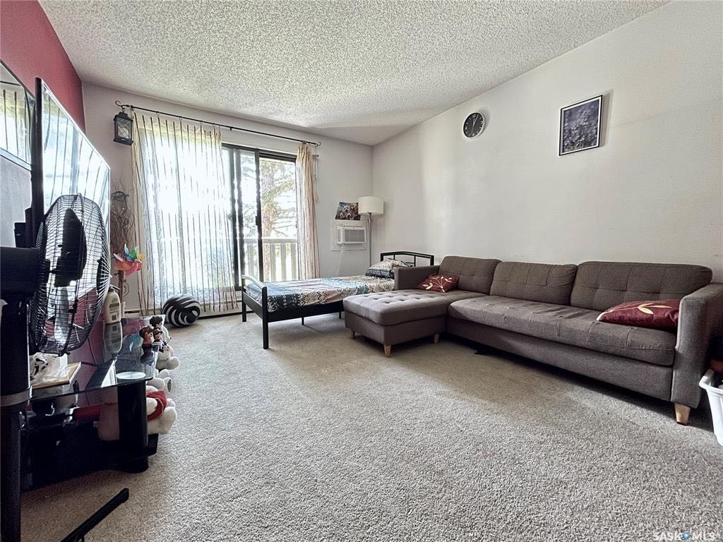 【萨屯房源】Wildwood社区公寓出售，831尺平层，2房1卫，套内洗衣房，阳台带储藏室，公寓楼背靠绿地，挂牌价仅：$128,800  - 5