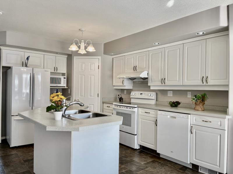 林与唐地产独家代理：Arbor Creek社区|4室3卫，1268尺Bi-Level独栋出售|挂牌价$43.99万 - 4