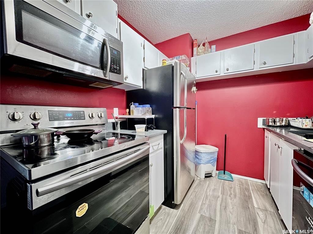 【萨屯房源】Wildwood社区公寓出售，831尺平层，2房1卫，套内洗衣房，阳台带储藏室，公寓楼背靠绿地，挂牌价仅：$128,800  - 7