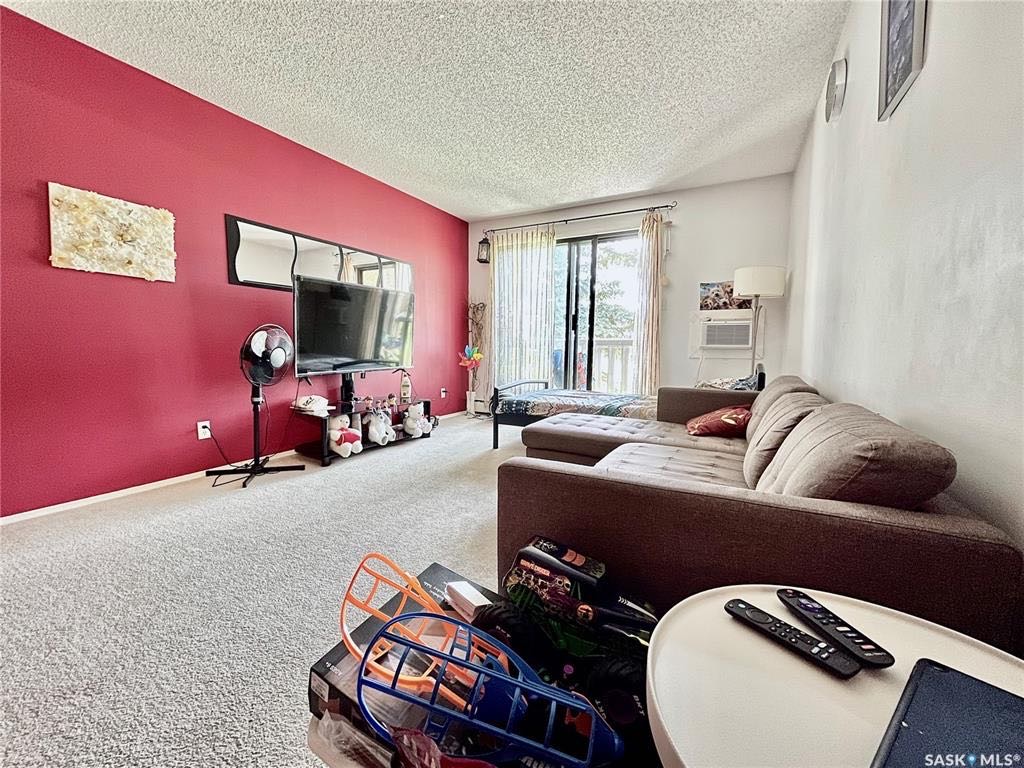 【萨屯房源】Wildwood社区公寓出售，831尺平层，2房1卫，套内洗衣房，阳台带储藏室，公寓楼背靠绿地，挂牌价仅：$128,800  - 6